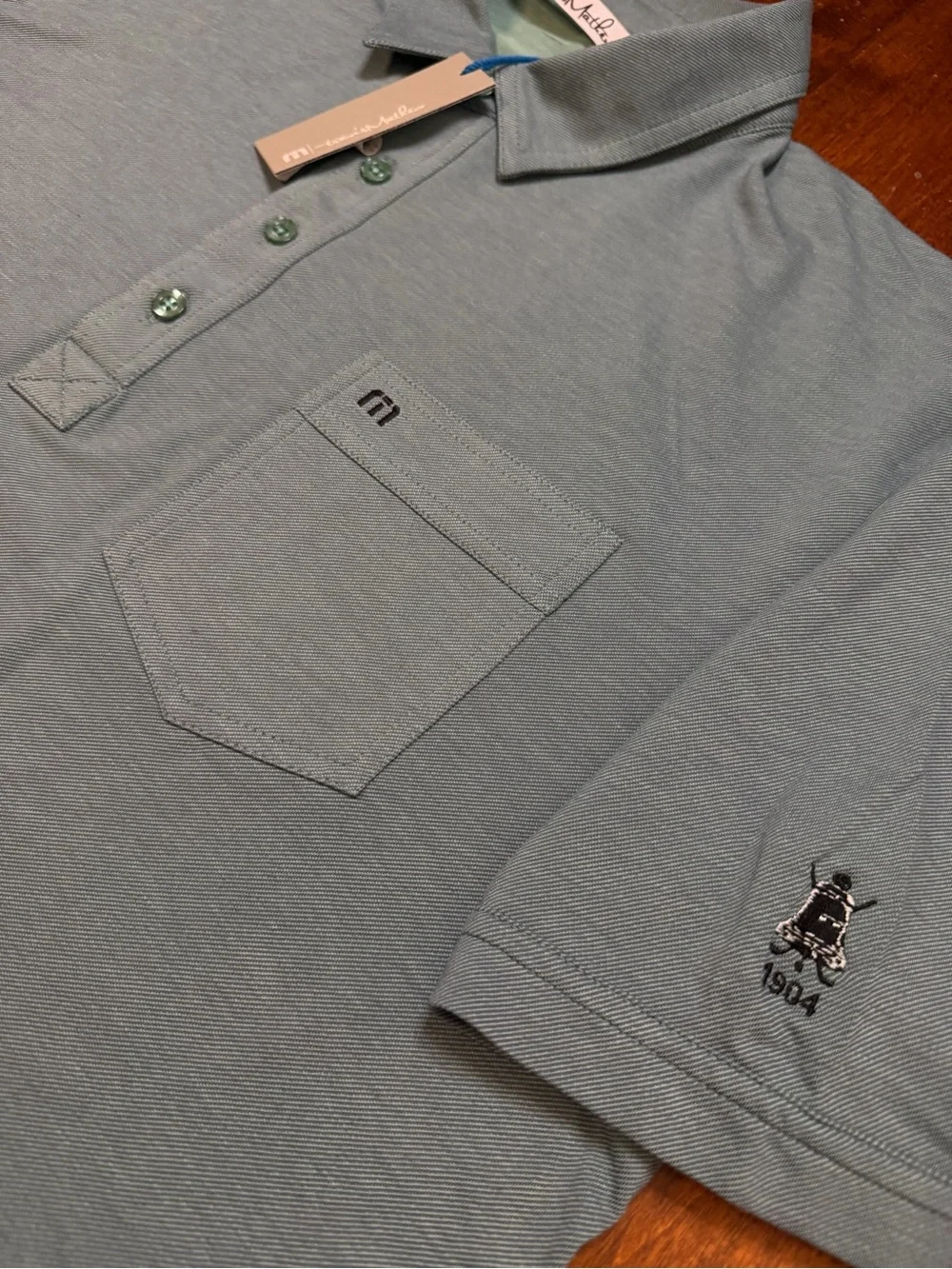 Travis Mathew three muted button